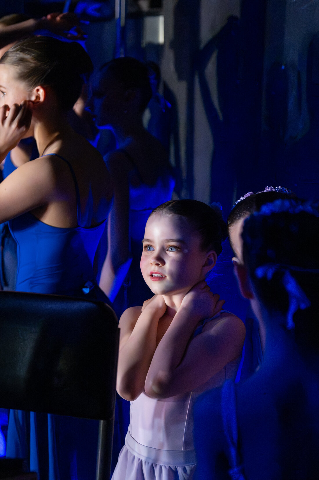 A young dancer in the wings before the Grand Défilé